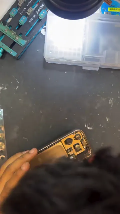 Inside a logic board fix - Fixerland repair video poster